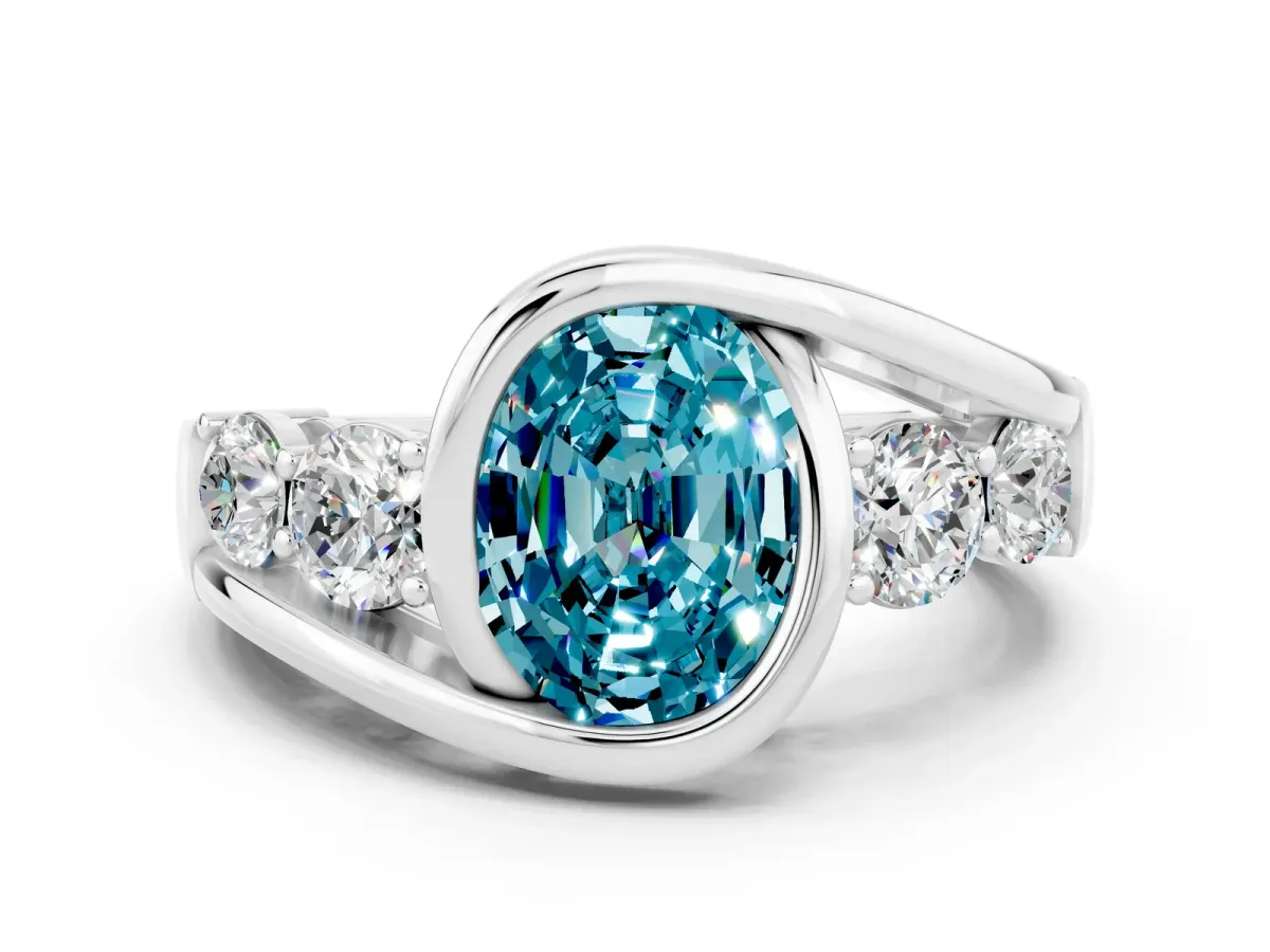 Bezel Set Oval Cut Blue Topaz Bypass Ring with Round Accents Platinum