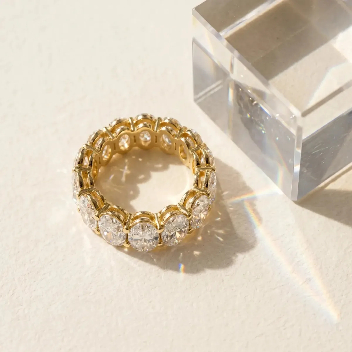 Oval Cut Diamond Eternity Band with Shared Prong Setting Yellow gold