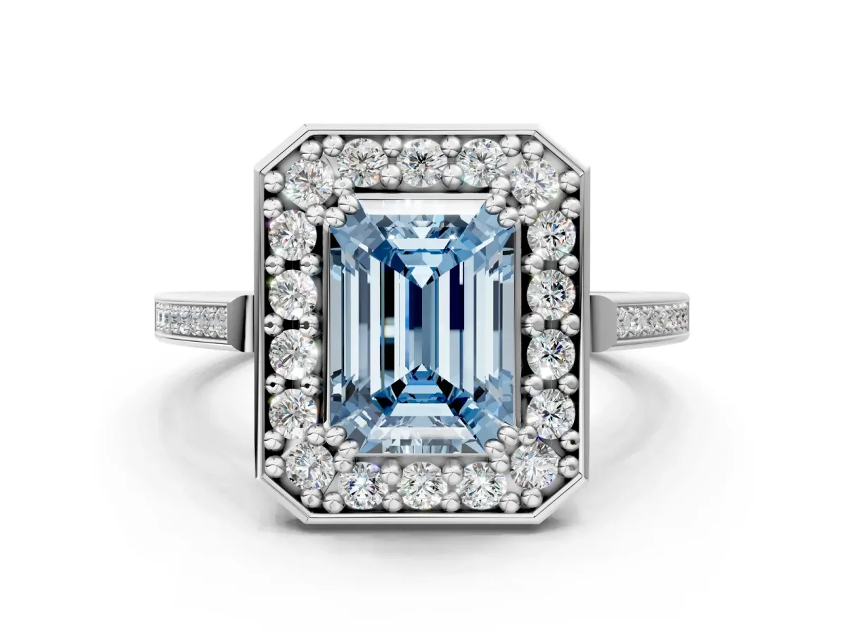 Fancy Blue Emerald Cut Diamond Halo Ring with Split Shank and Four-Prong Setting White gold