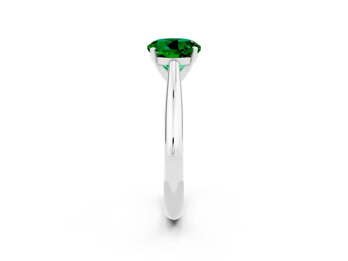 Round Cut Emerald Solitaire Engagement Ring with Cathedral Setting and Four-Prong Mount White gold