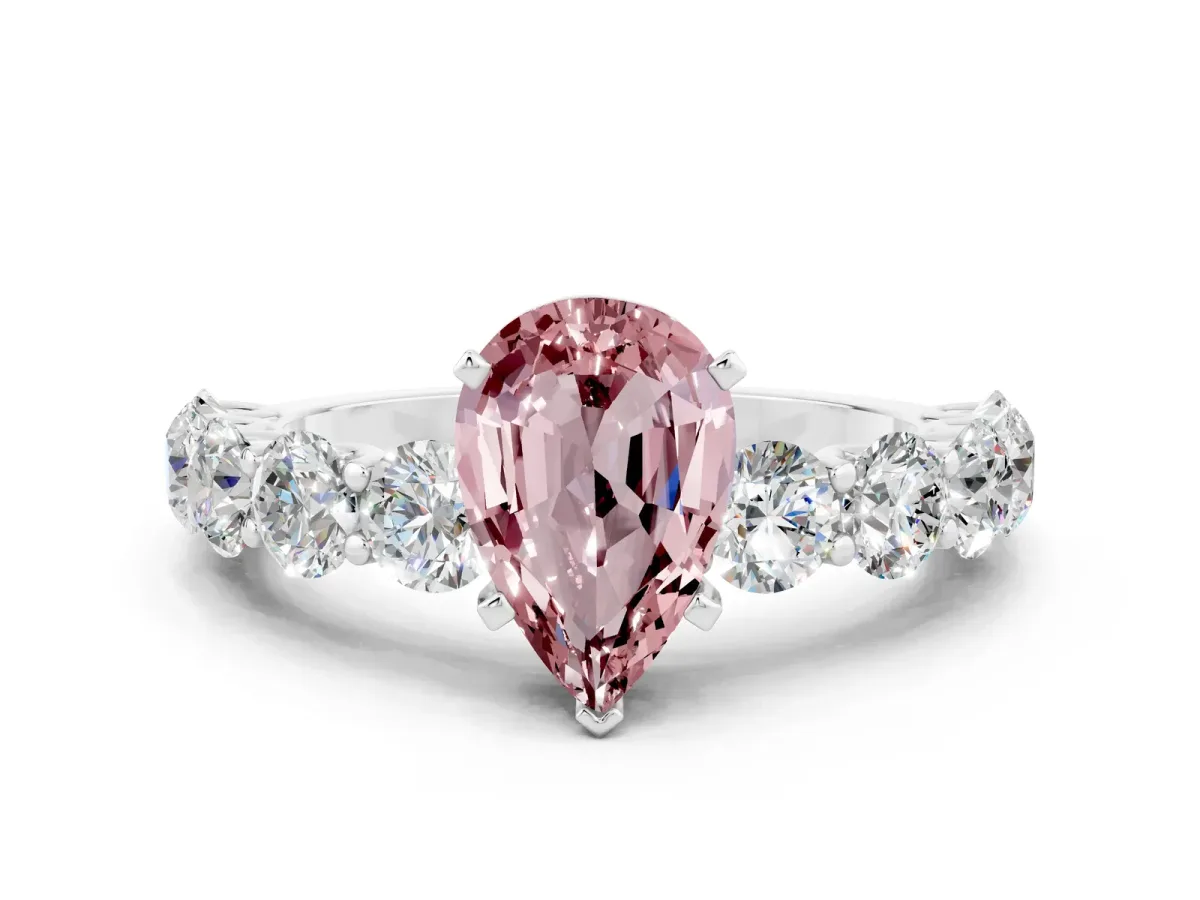 Pear Cut Morganite Prong Setting with Side Stones on a Pave Band Silver