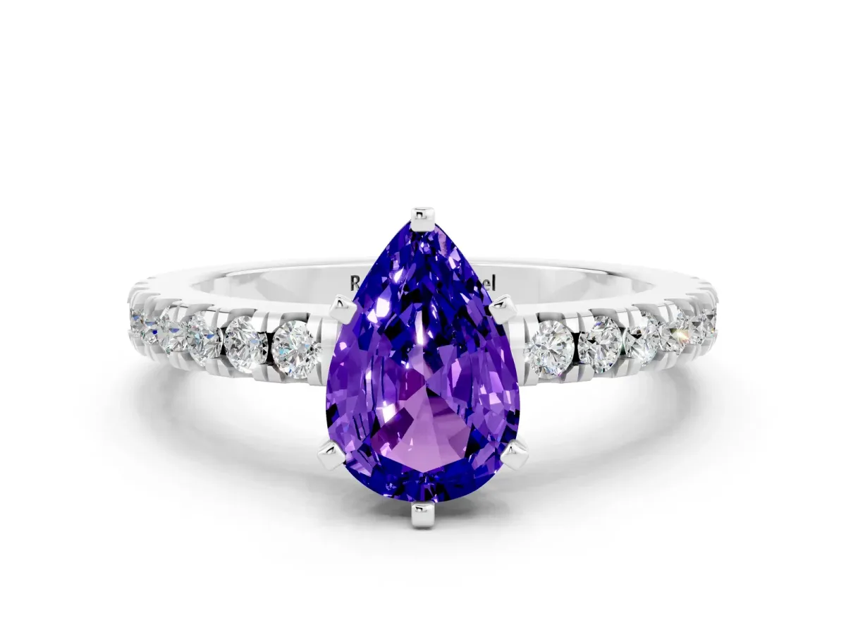 Pear Cut Solitaire Tanzanite with Pavé Band and Four-Prong Setting Silver