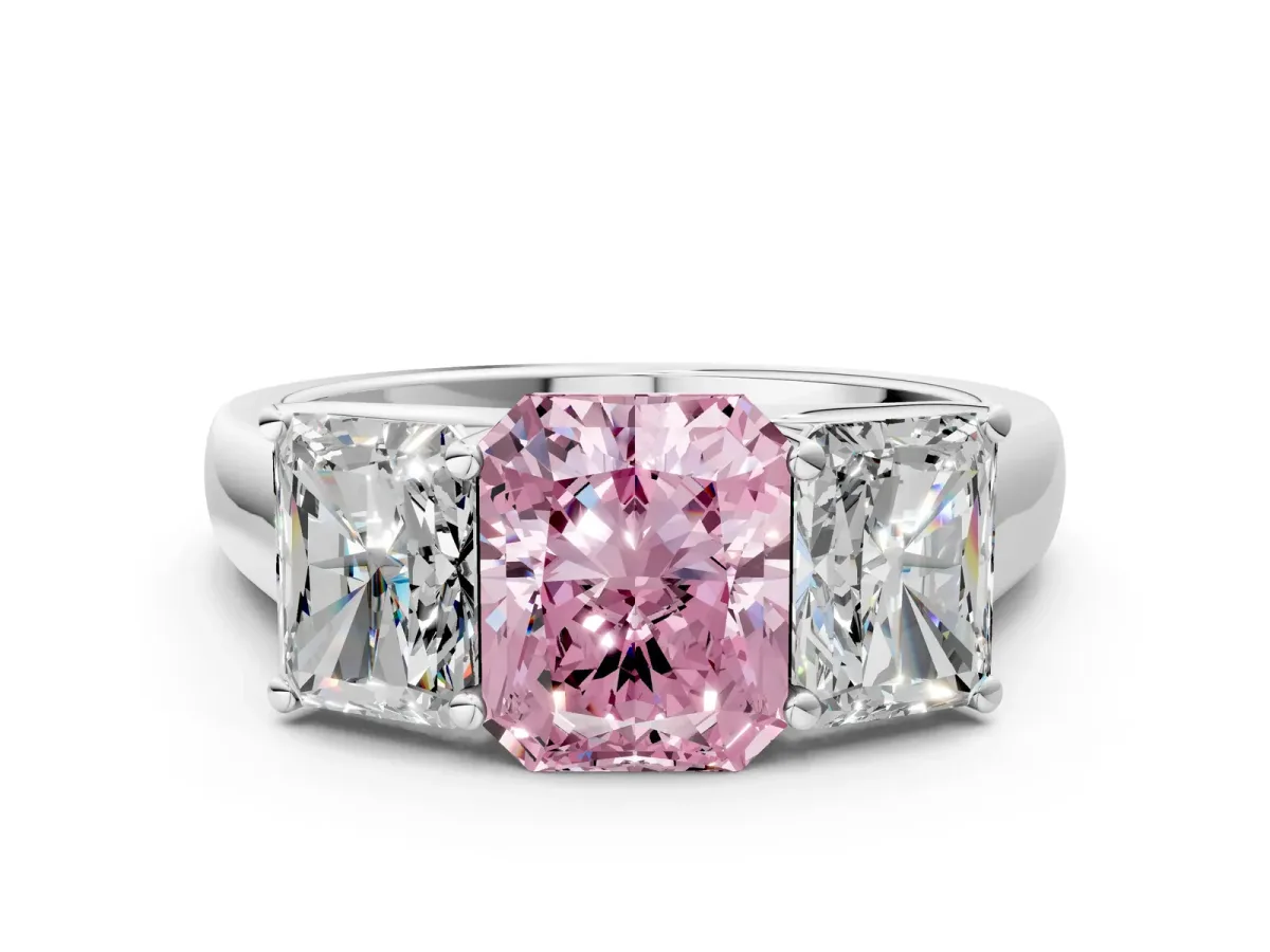 Fancy Pink Radiant Cut Three-Stone Diamond Ring with Prong Setting on a Classic Band Platinum