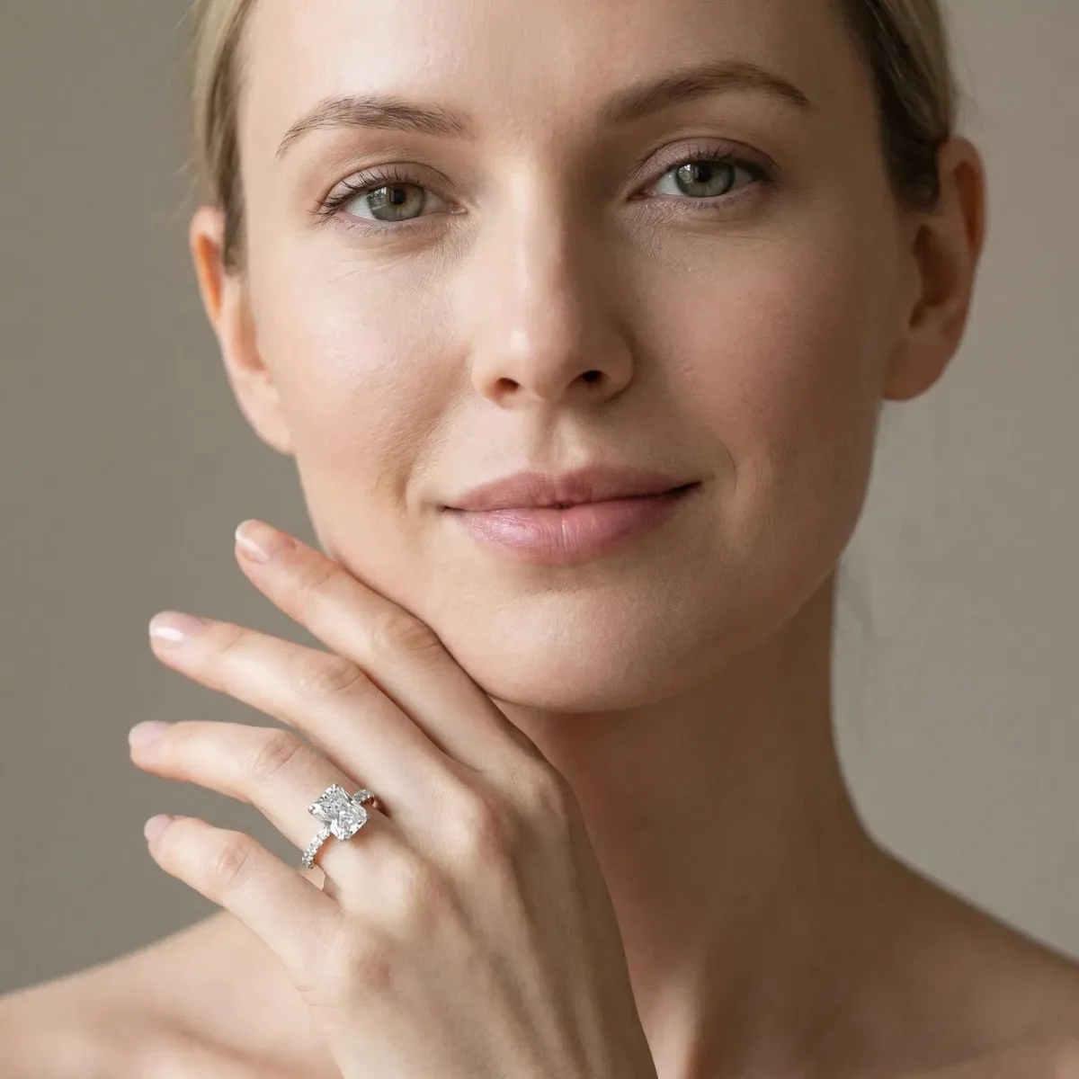Radiant Cut Diamond Solitaire Ring with Round Pavé Band and Four-Prong Setting Silver