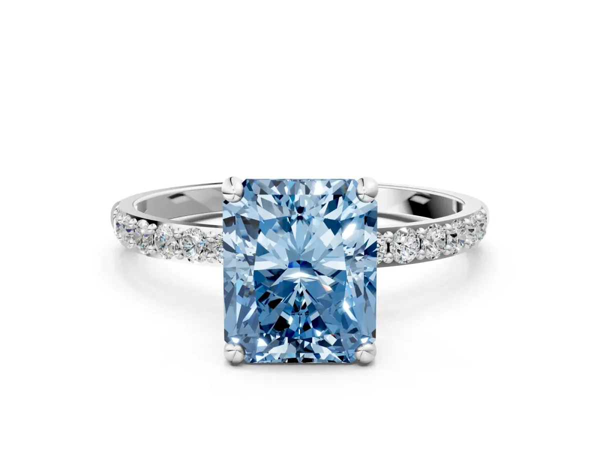 Fancy Blue Radiant Cut Diamond Solitaire Ring with Round Pavé Band and Prong Setting Silver