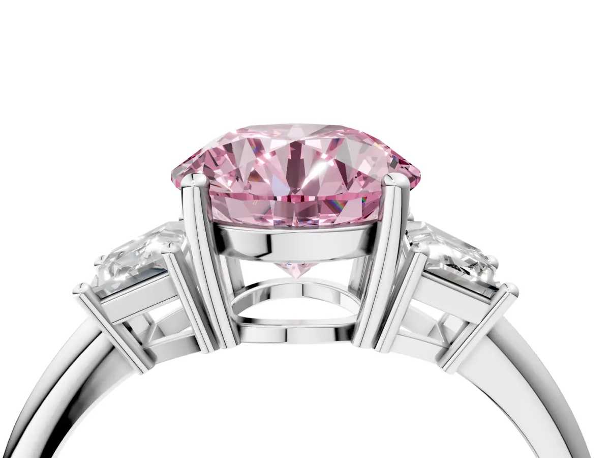 Fancy Pink Round Cut Diamond Three-Stone Ring with Trapezoid Side Stones and Prong Setting Platinum
