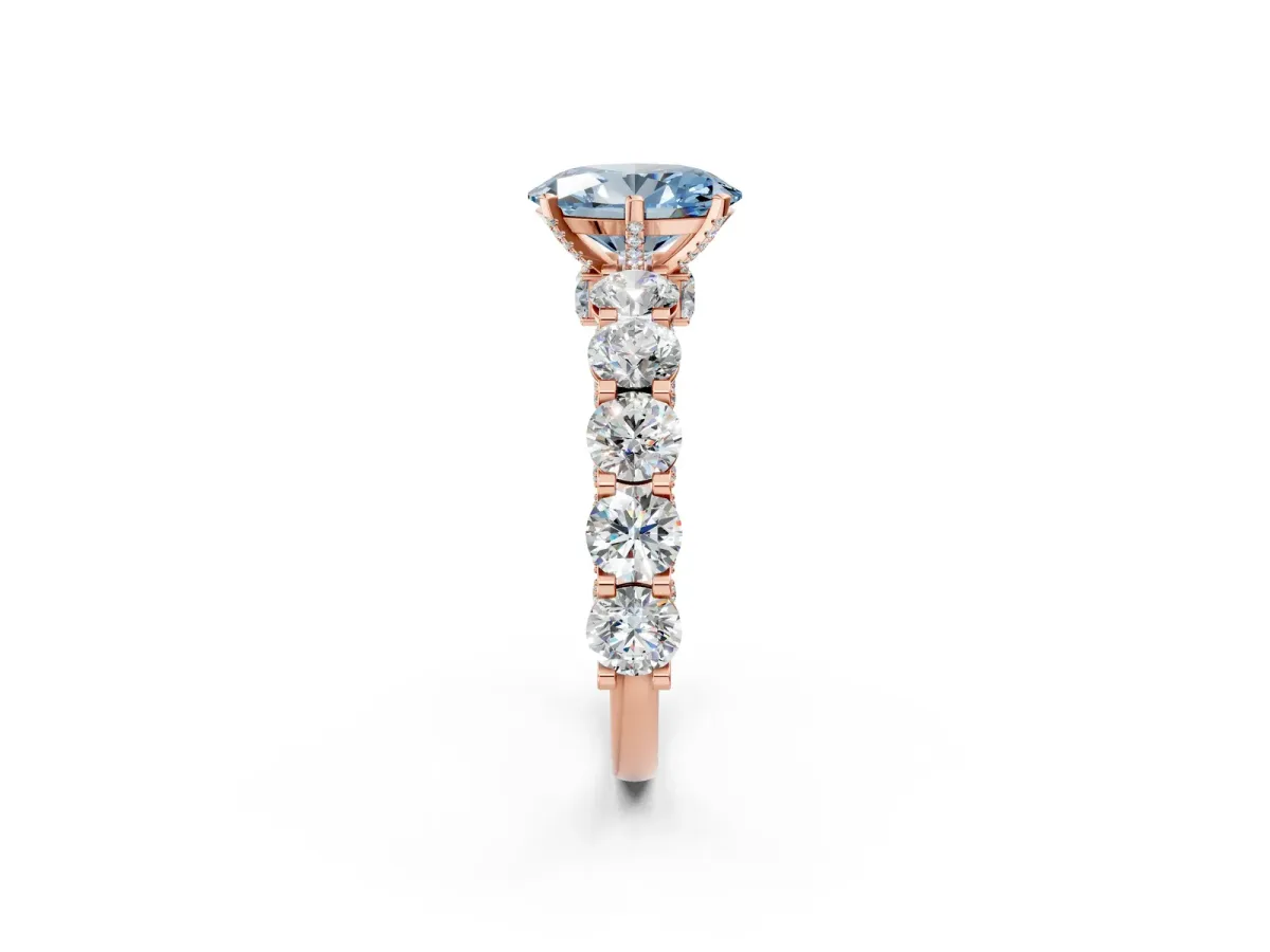 Fancy Blue Oval Cut Diamond Side Stone Engagement Ring with Four-Prong Setting Rose gold