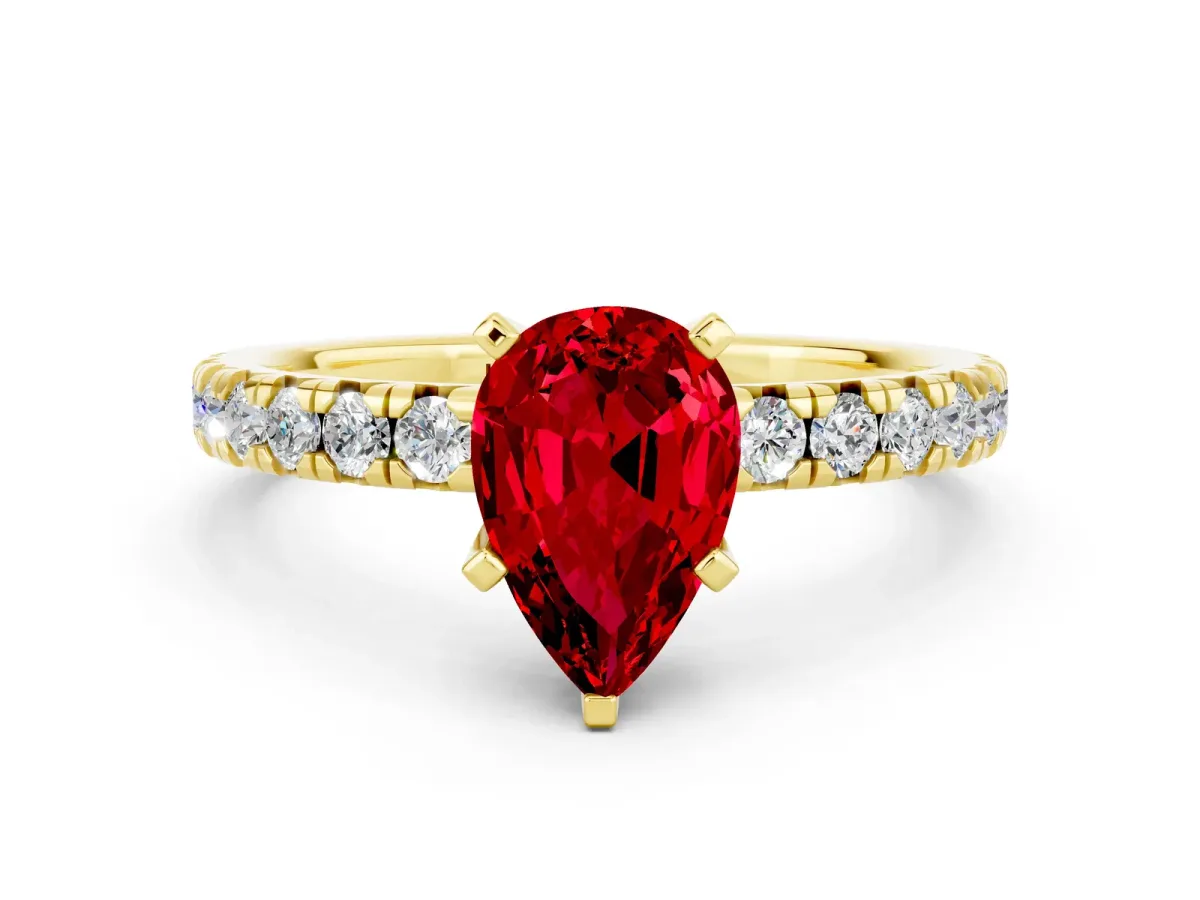 Pear Cut Ruby Solitaire Pavé Engagement Ring with Round Band and Prong Setting Yellow gold
