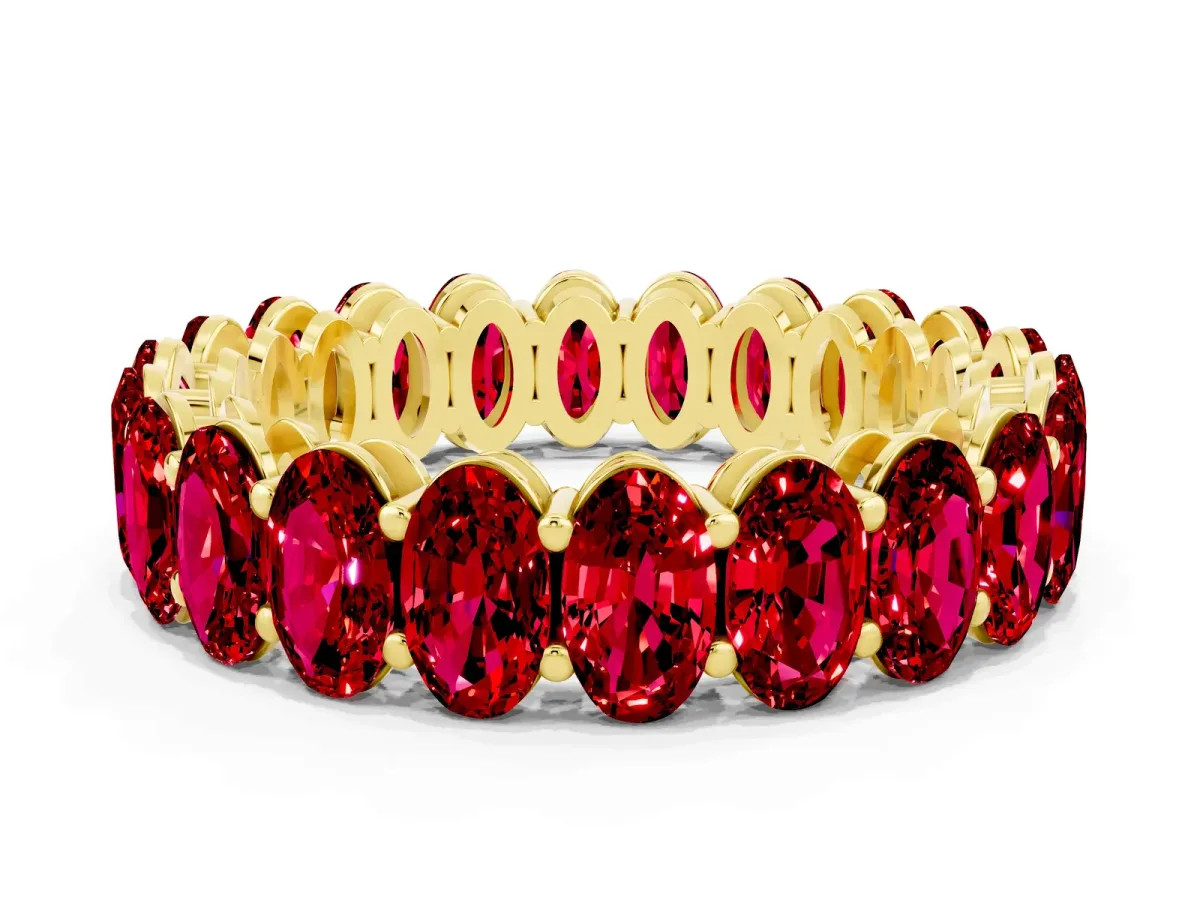 Oval Cut Ruby Eternity Band with Shared Prong Setting Yellow gold