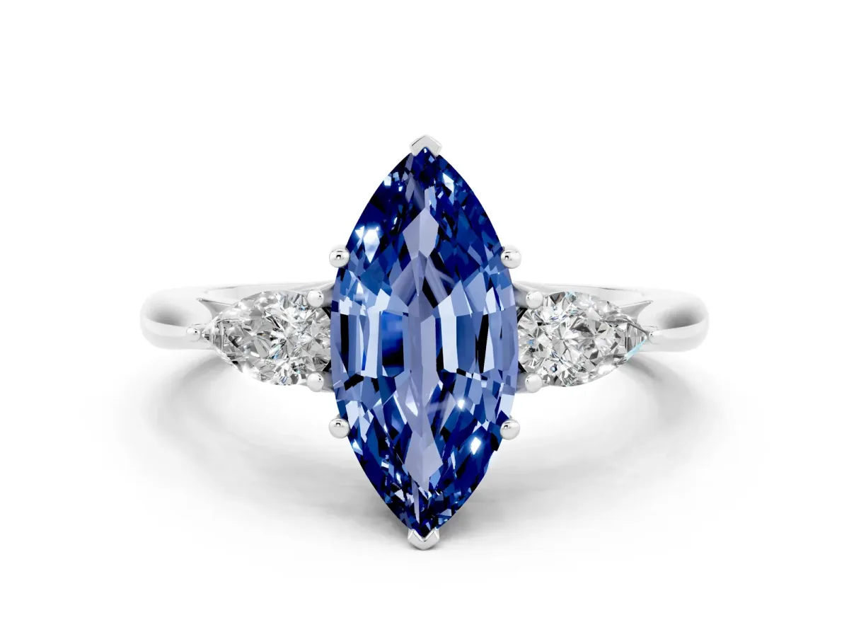 Marquise Cut Blue Sapphire Three-Stone Ring with Pear Side Stones and Prong Setting Silver