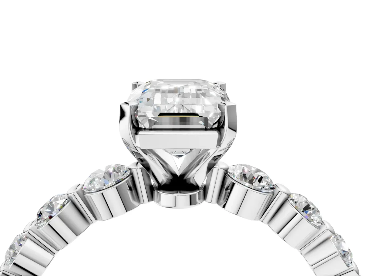 Emerald Cut Solitaire Diamond Ring with Pave Band and Four-Prong Setting Platinum