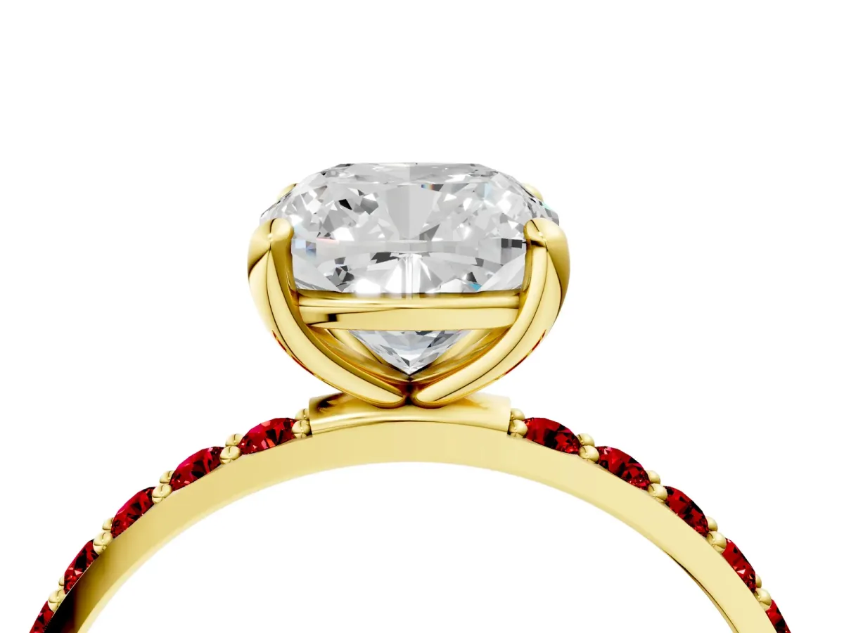 Cushion Cut Diamond Solitaire Ring with Round Ruby Pavé Band and Prong Setting Yellow gold