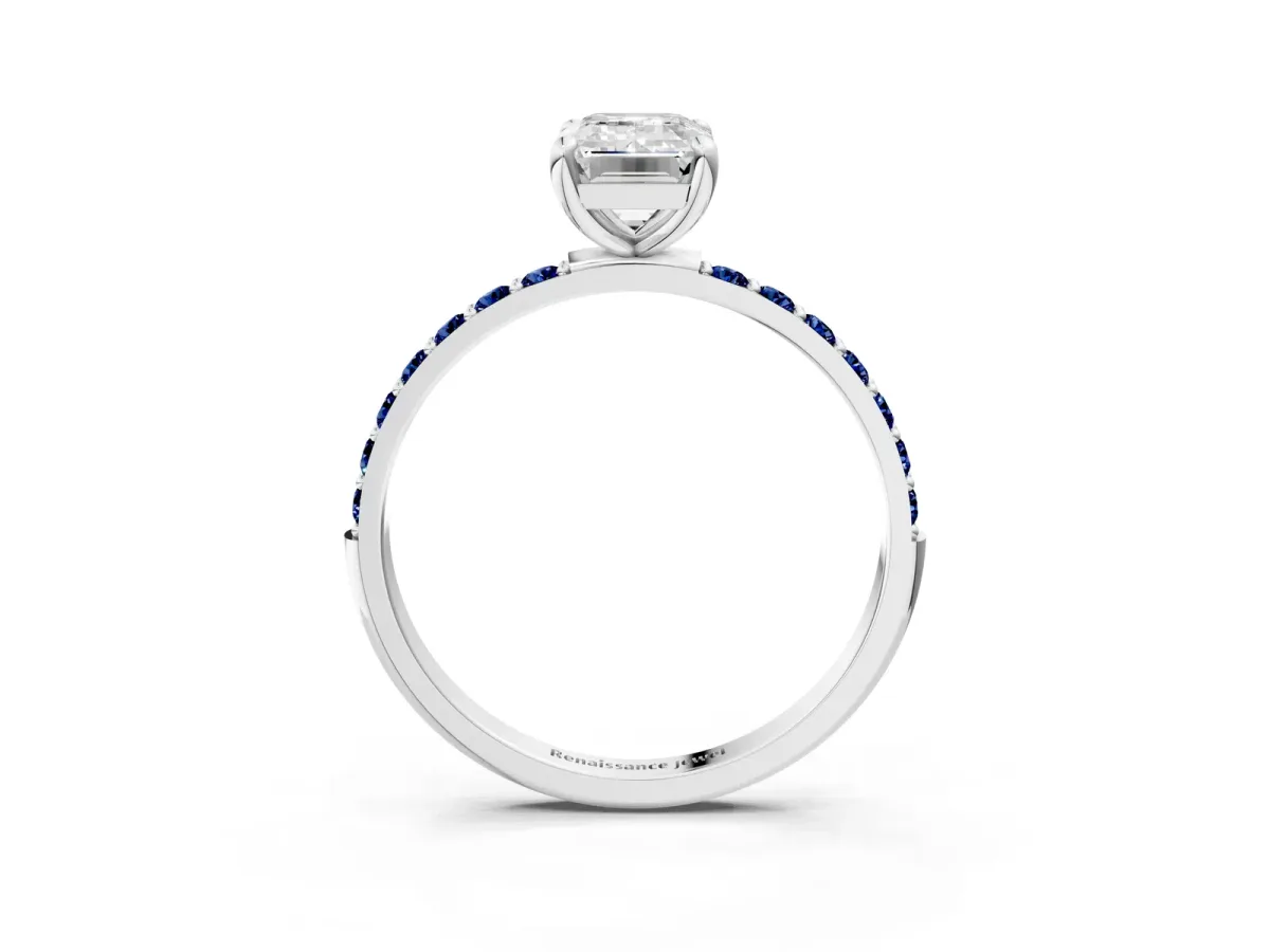 Emerald Cut Diamond Solitaire Ring with Round Blue Sapphire Pavé Band and Prong Setting Silver