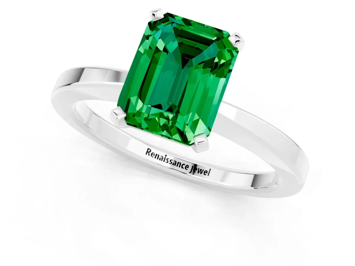 Emerald Cut Emerald Solitaire Engagement Ring with Classic Band and Four-Prong Setting Platinum