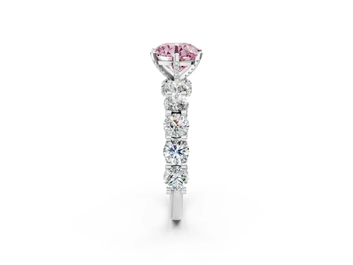Fancy Pink Round Cut Diamond Side Stone Engagement Ring with Four-Prong Setting Silver