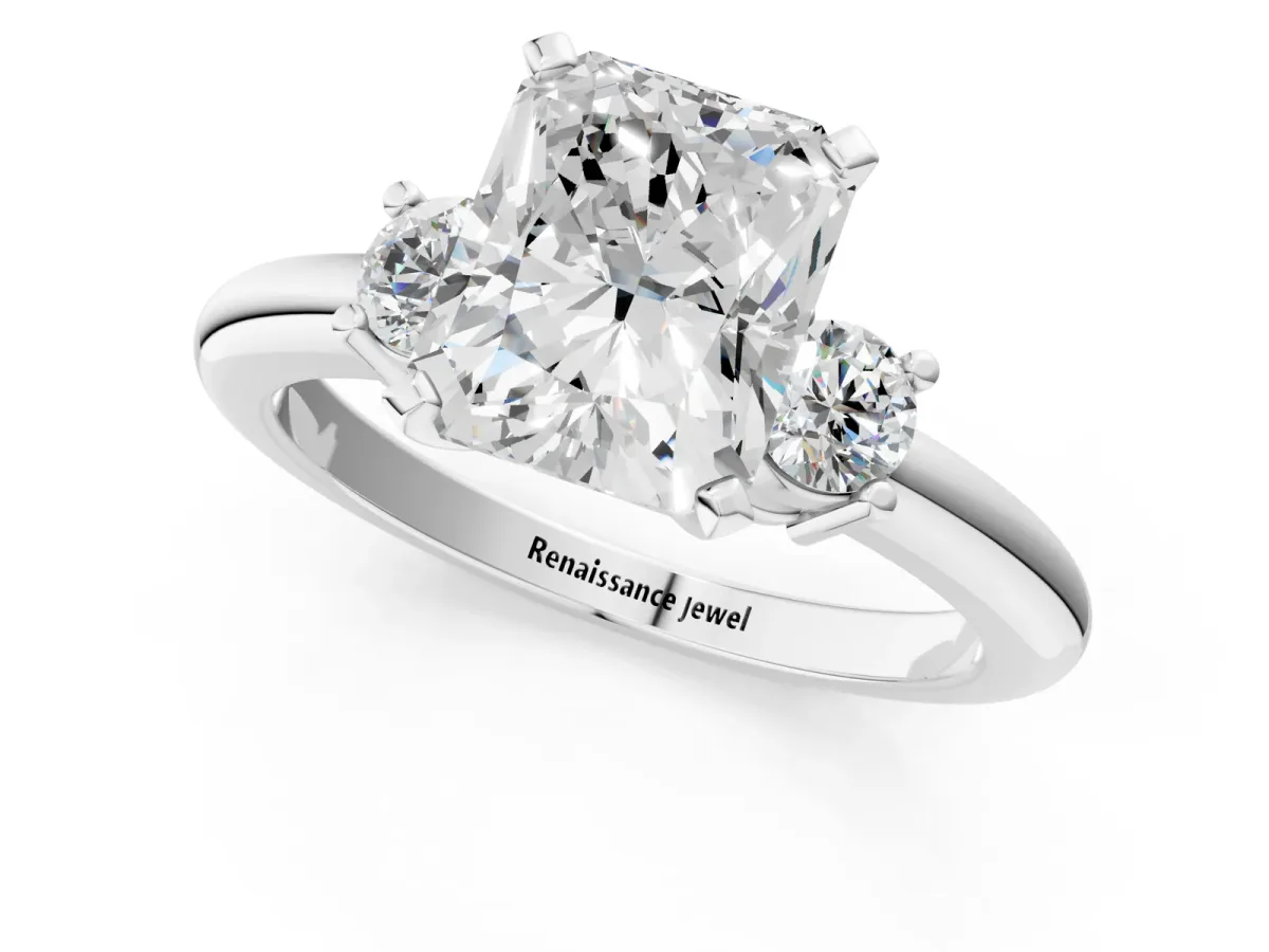 Three-Stone Radiant Cut Cut Diamond Solitaire with Prong Setting and Classic Band Platinum