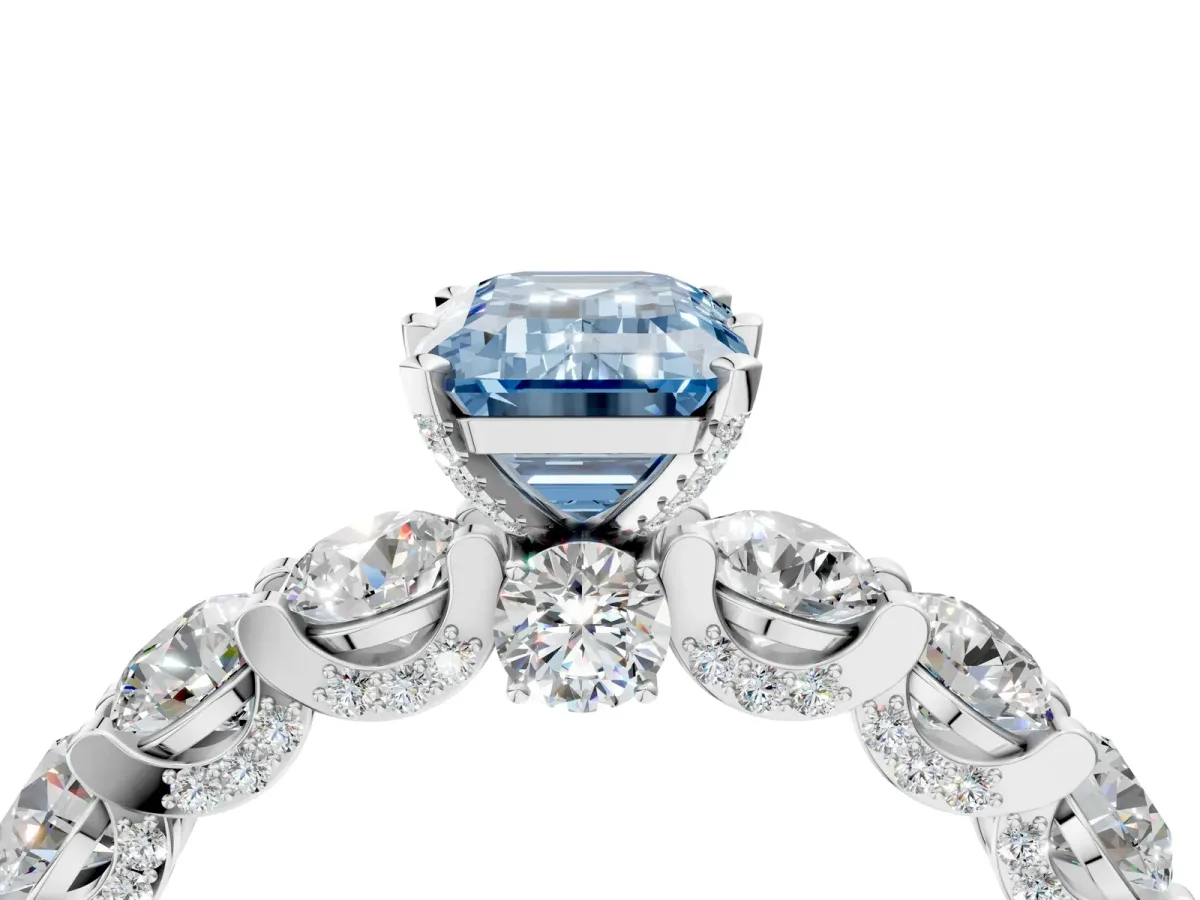 Fancy Blue Emerald Cut Diamond Side Stone Engagement Ring with Four-Prong Setting White gold