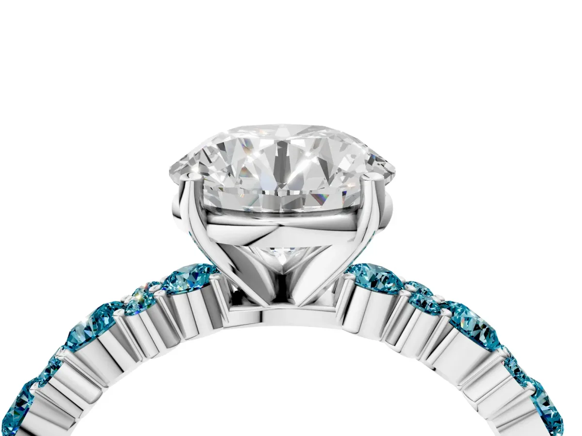 Round Cut Diamond Side Stone Solitaire Ring with Round Blue Topaz and Four-Prong Setting Silver