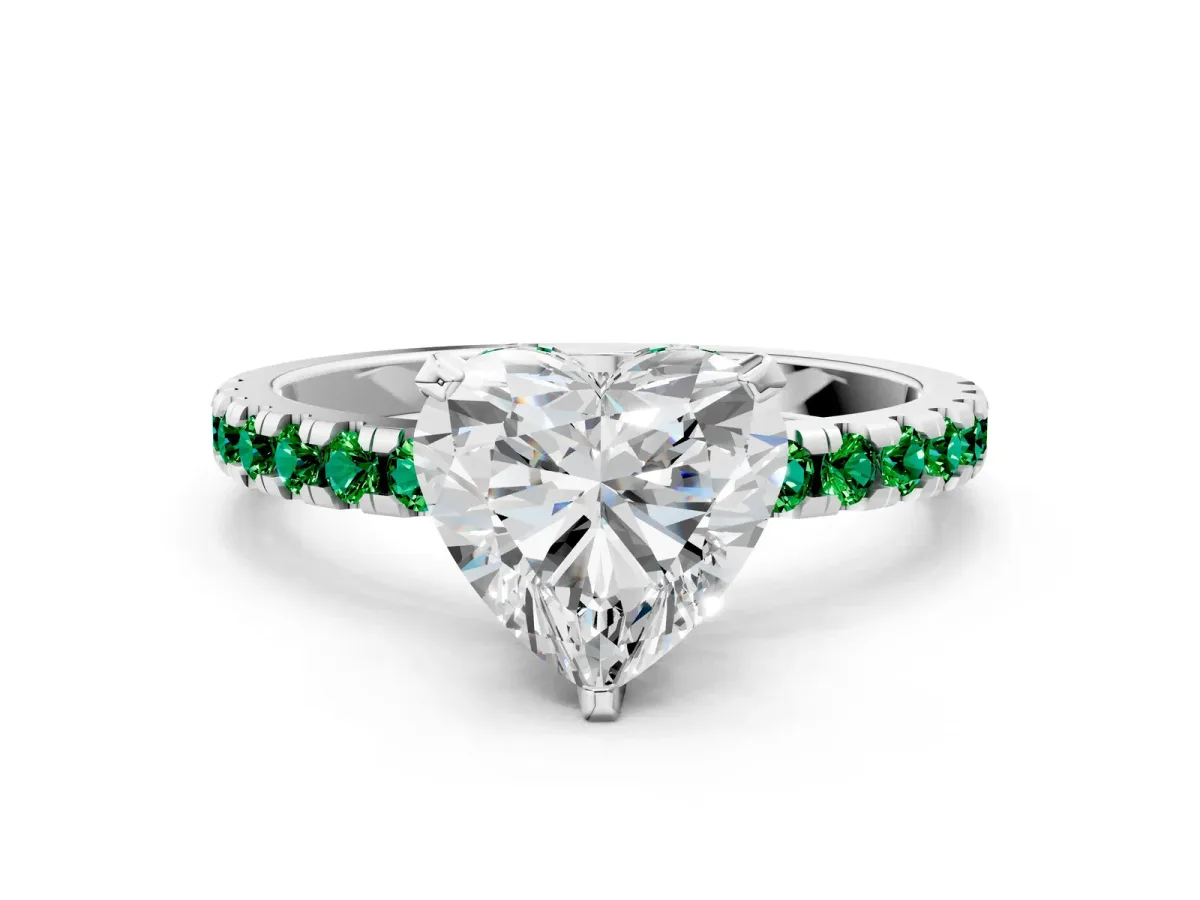 Heart Cut Diamond Solitaire Ring with Round Emerald Pavé Band and Four-Prong Setting Silver
