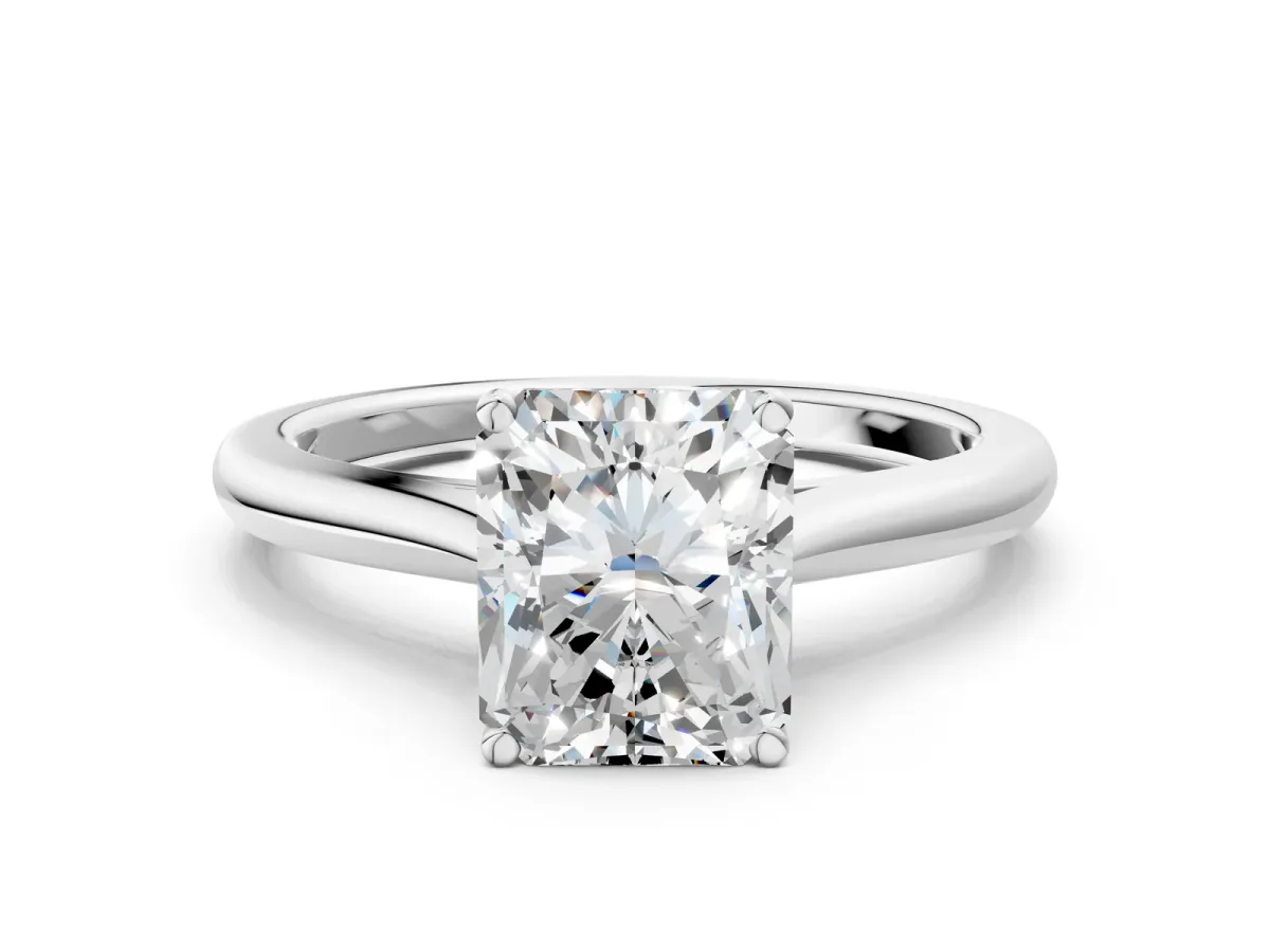 Radiant Cut Cut Solitaire Ring with Cathedral Band and Four-Prong Setting Platinum