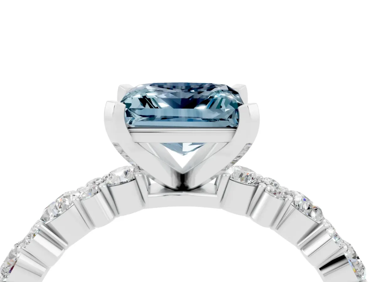 Princess Cut Aquamarine Side Stone Solitaire Ring with Round and Four-Prong Setting Silver