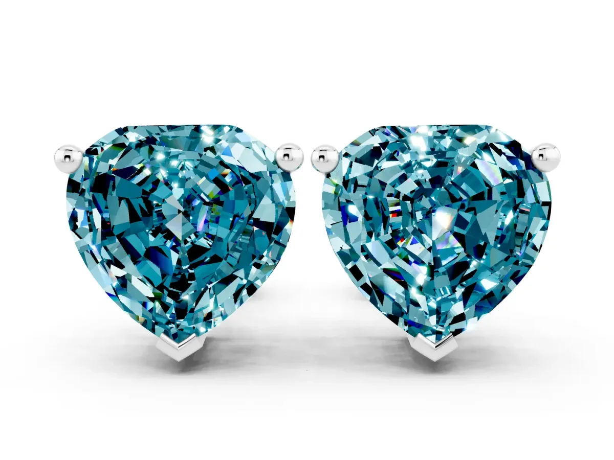 Heart Cut Blue Topaz Stud Earrings Platinum