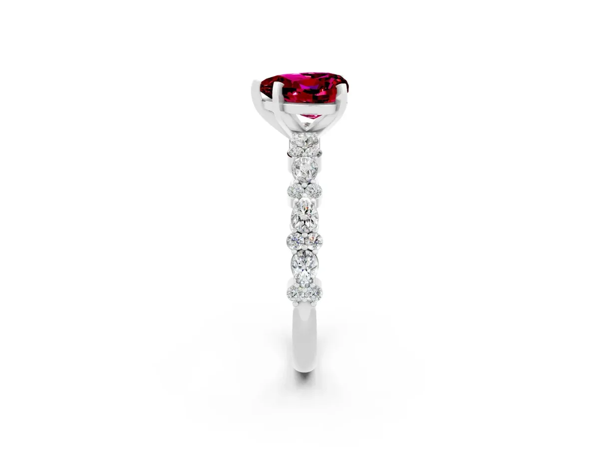 Heart Cut Garnet Side Stone Solitaire Ring with Round and Four-Prong Setting Platinum