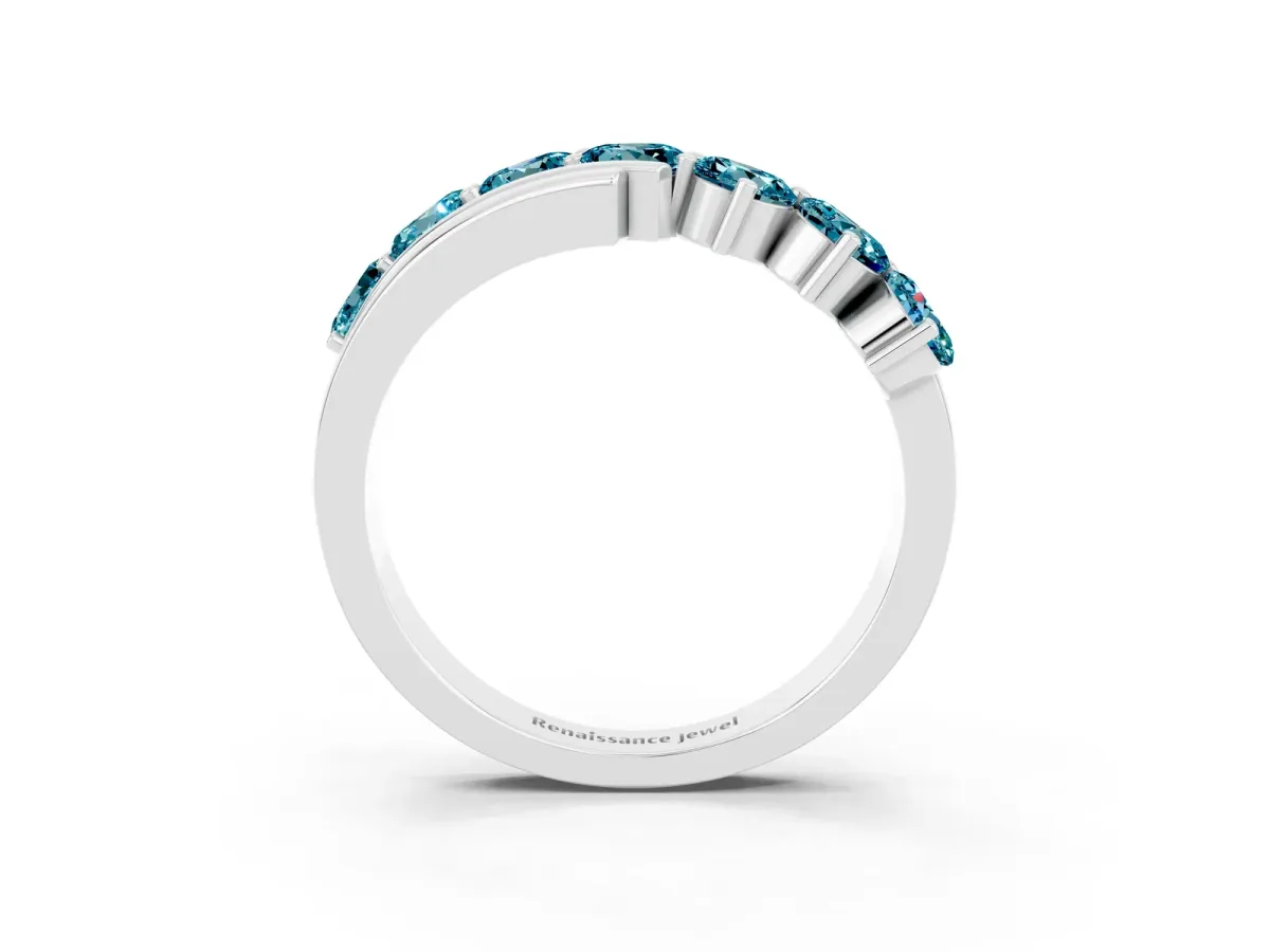 Round Blue Topaz Wave Band with Channel and Shared Prong Setting Silver