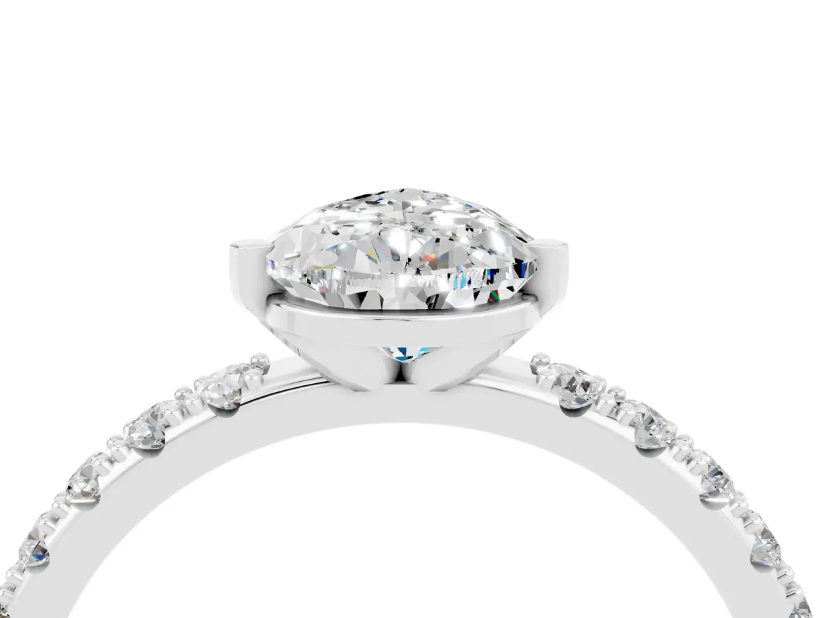 Pear Cut Moissanite Solitaire Pavé Band with Four-Prong Setting Silver