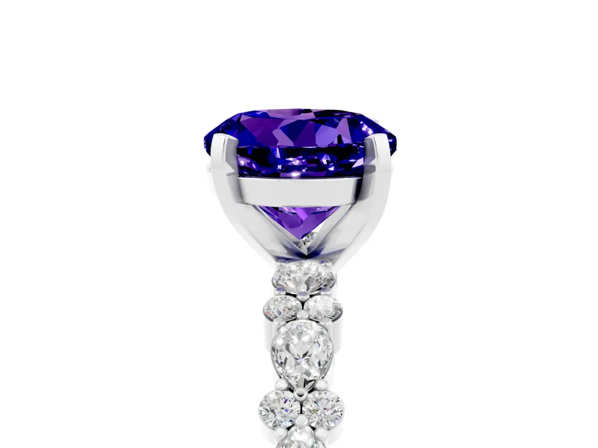 Round Cut Tanzanite Side Stone Solitaire Ring with Round and Four-Prong Setting Silver