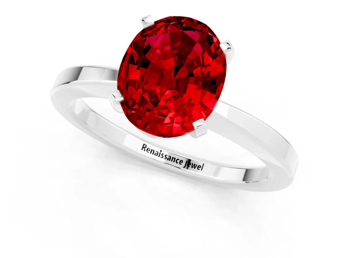 Oval Cut Ruby Solitaire Engagement Ring with Classic Band and Four-Prong Setting Silver