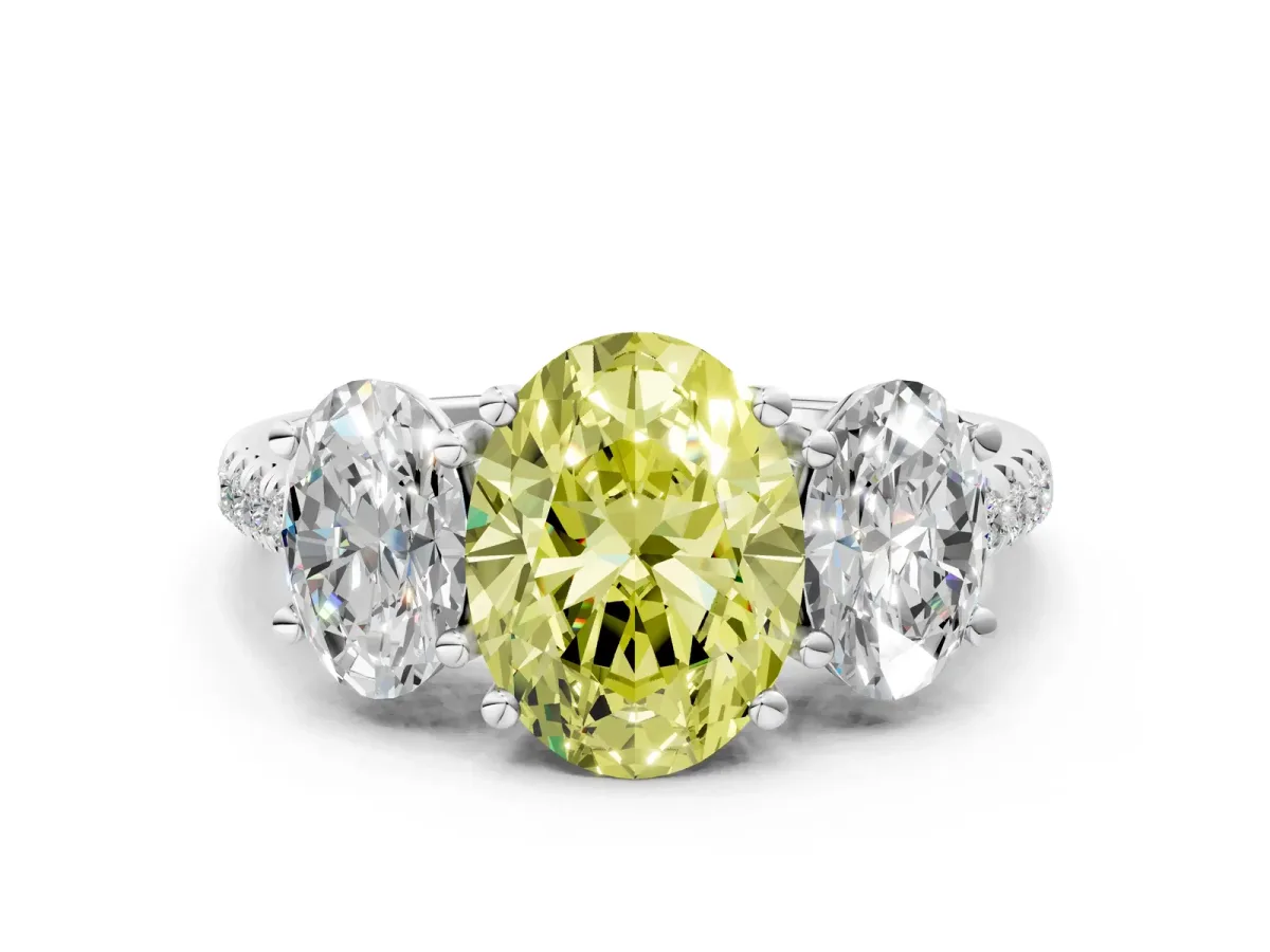Fancy Yellow Three-Stone Oval Cut Diamond Ring with Round Pavé Band and Prong Setting Platinum