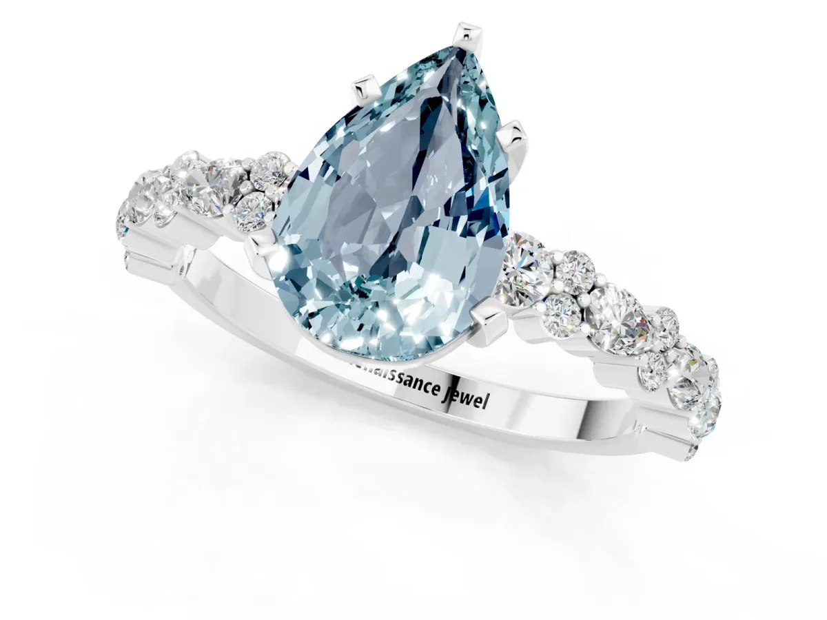 Pear Cut Aquamarine Side Stone Solitaire Ring with Round and Four-Prong Setting Silver