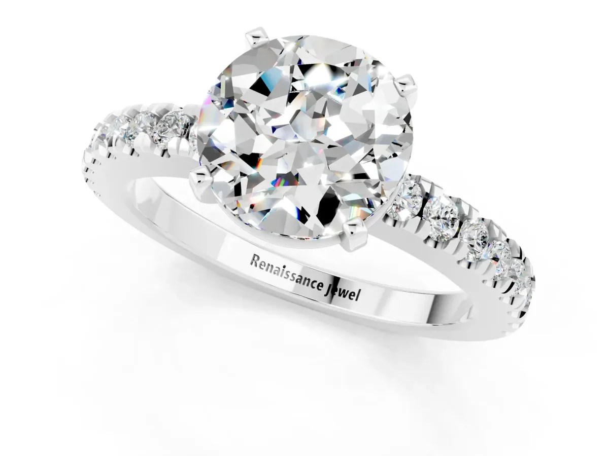 Round Cut Solitaire Moissanite with Pavé Band and Four-Prong Setting Silver