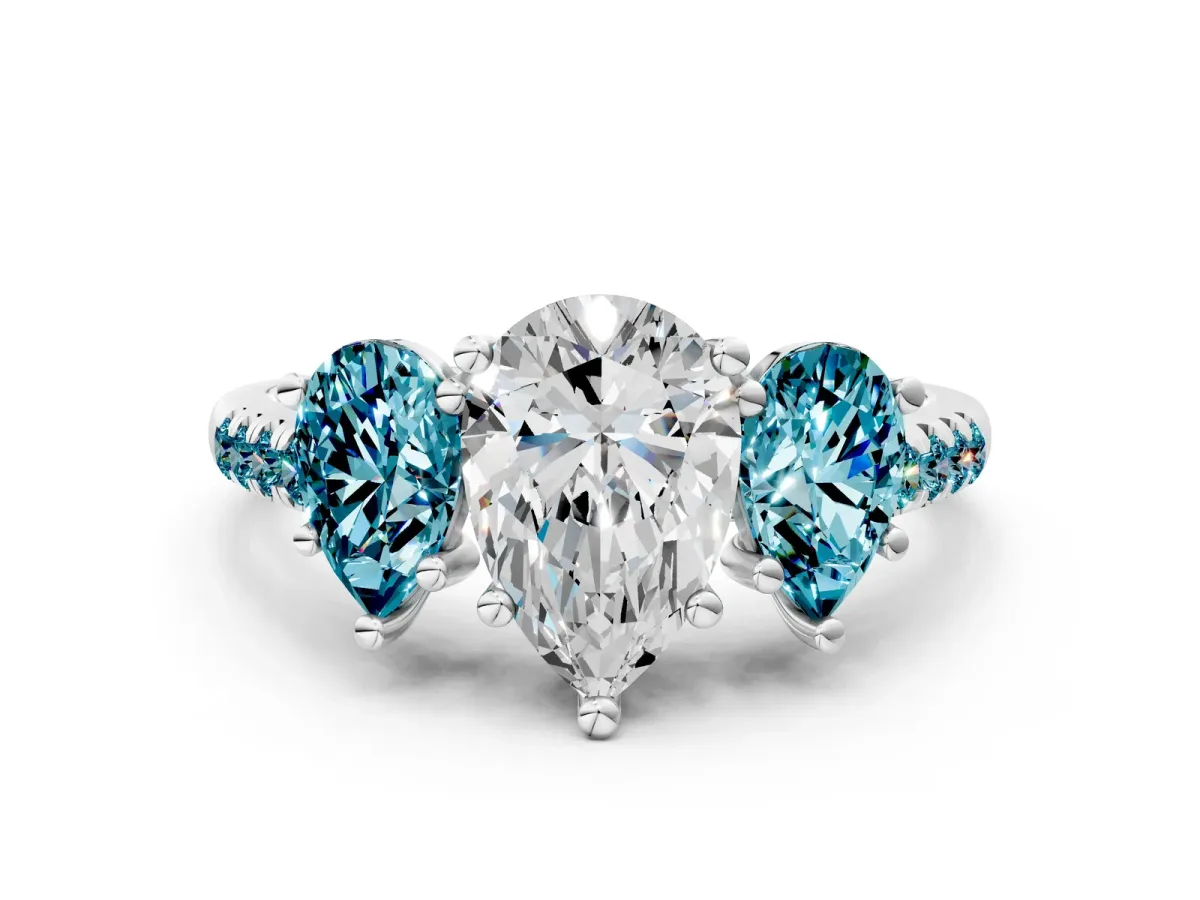 Three-Stone Pear Cut Diamond Ring with Round Blue Topaz Pavé Band and Prong Setting Silver