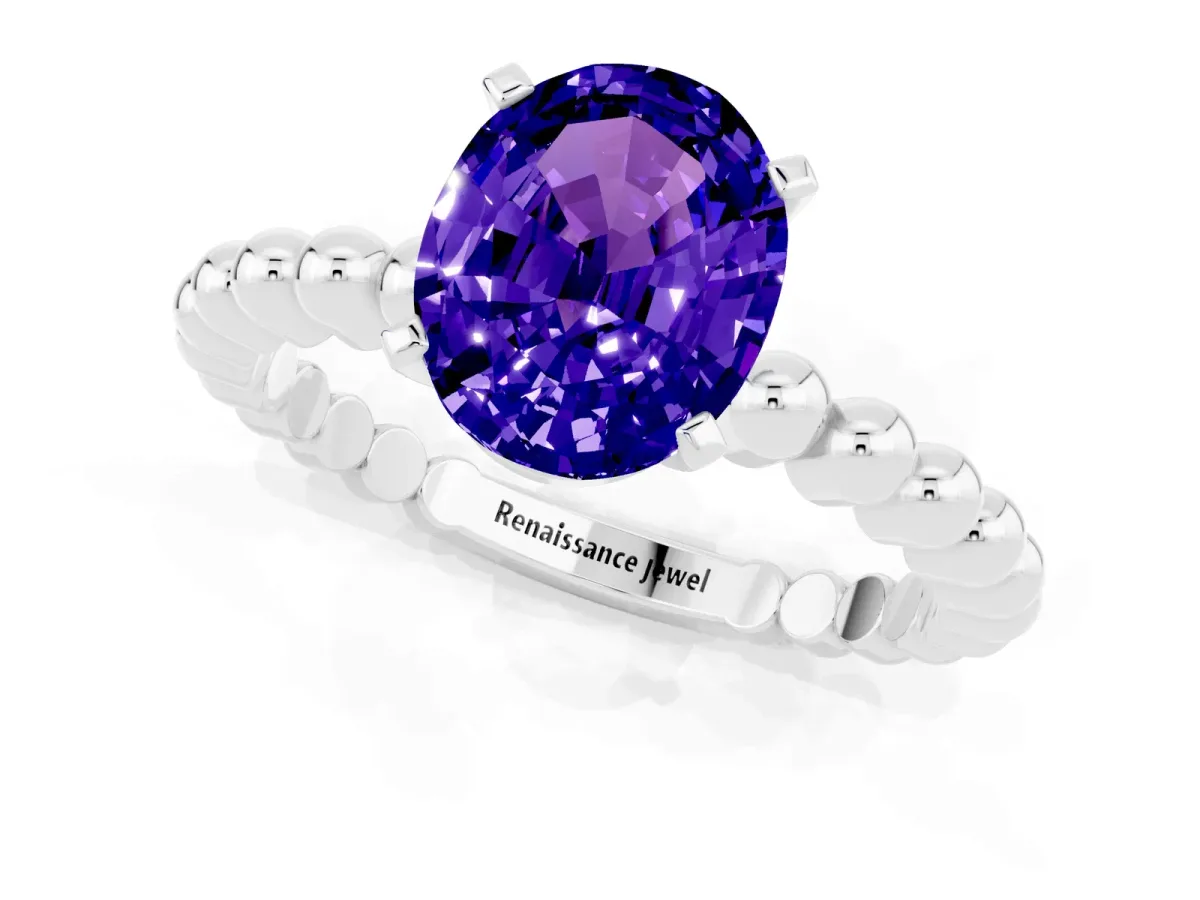 Oval Cut Tanzanite Solitaire Ring with Beaded Band and Prong Setting Silver