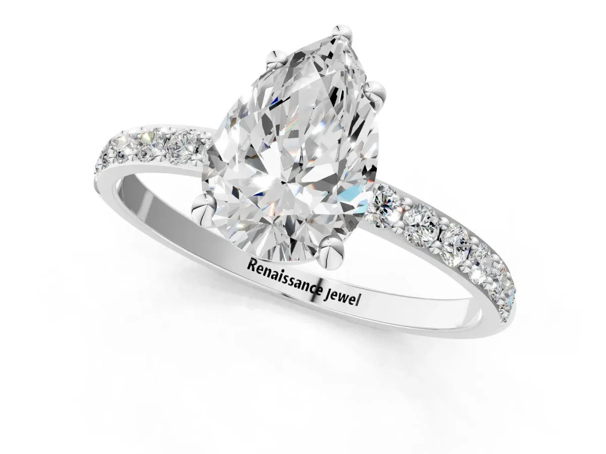Pear Cut Diamond Solitaire Ring with Round Pavé Band and Prong Setting Platinum