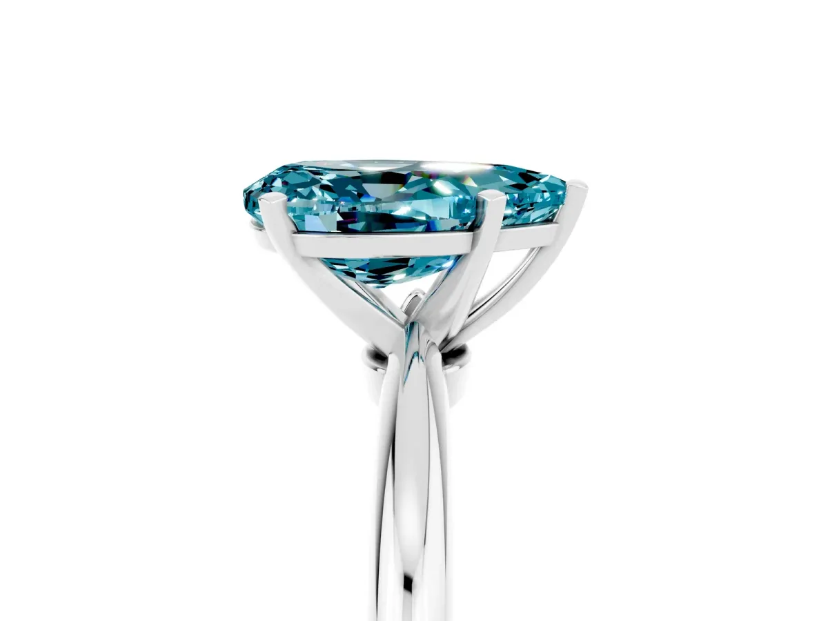Pear Cut Blue Topaz Solitaire Ring with Six-Prong Setting and Classic Band Silver