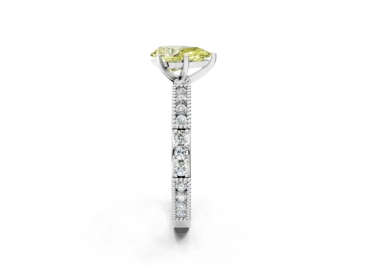 Fancy Yellow Pear Cut Solitaire with Pavé Band and Four-Prong Setting Silver