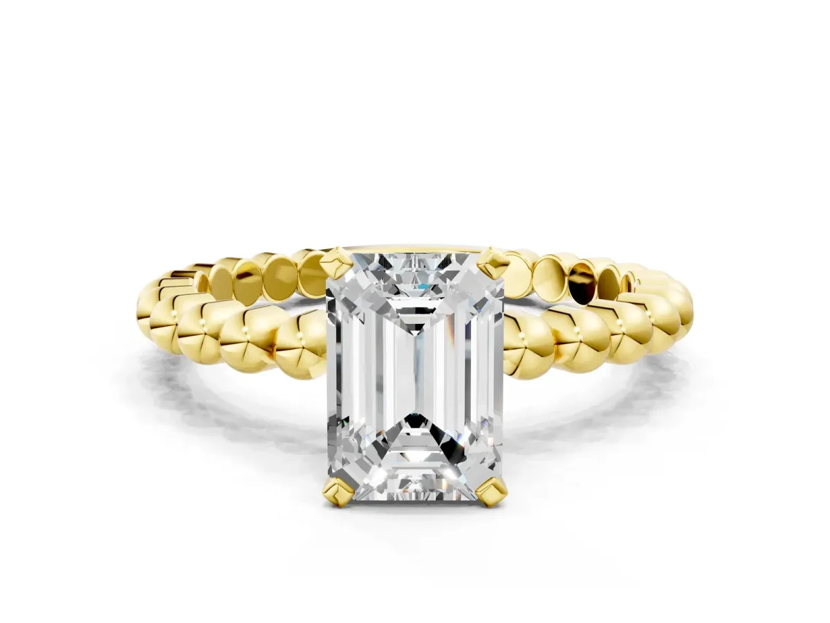 Emerald Cut Diamond Solitaire Ring with Beaded Band and Prong Setting Yellow gold