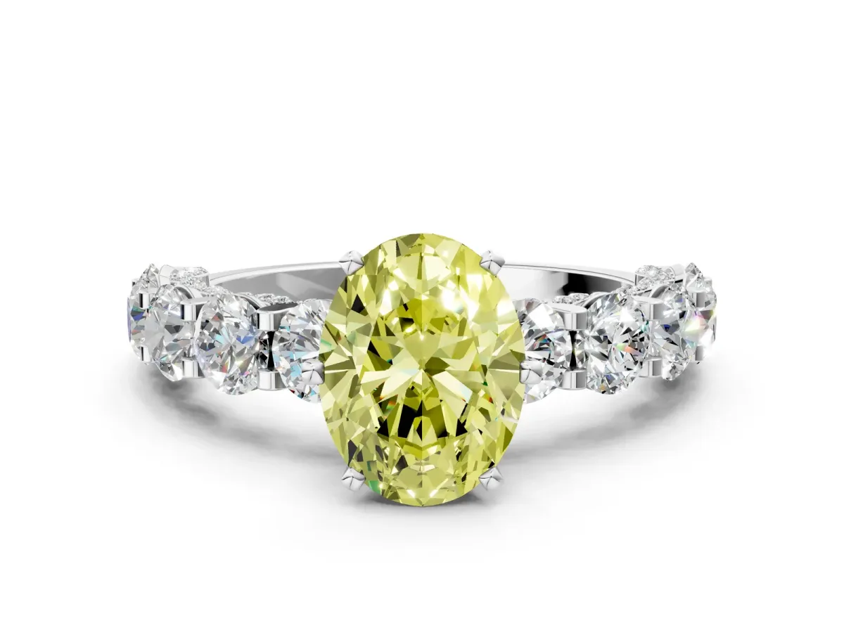 Fancy Yellow Oval Cut Diamond Side Stone Engagement Ring with Four-Prong Setting White gold