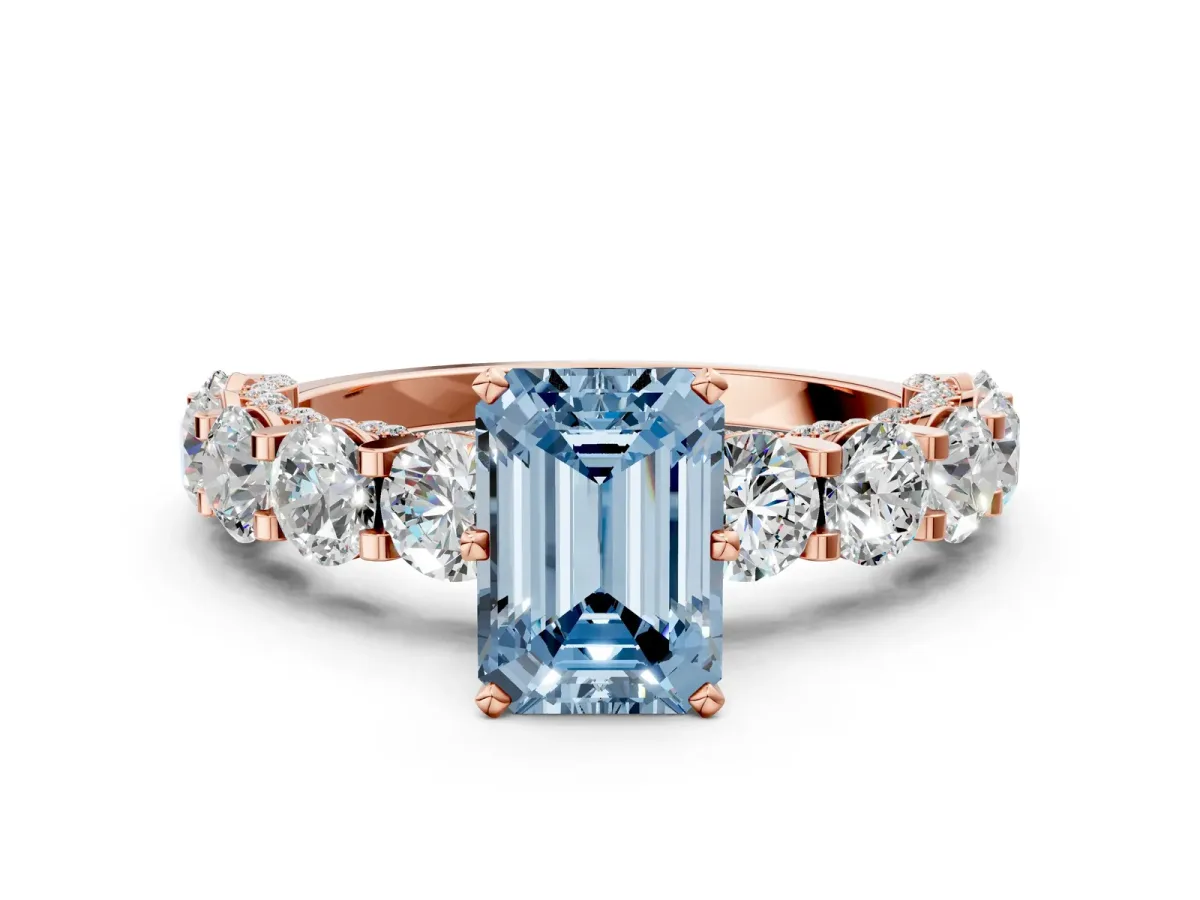 Fancy Blue Emerald Cut Diamond Side Stone Engagement Ring with Four-Prong Setting Rose gold