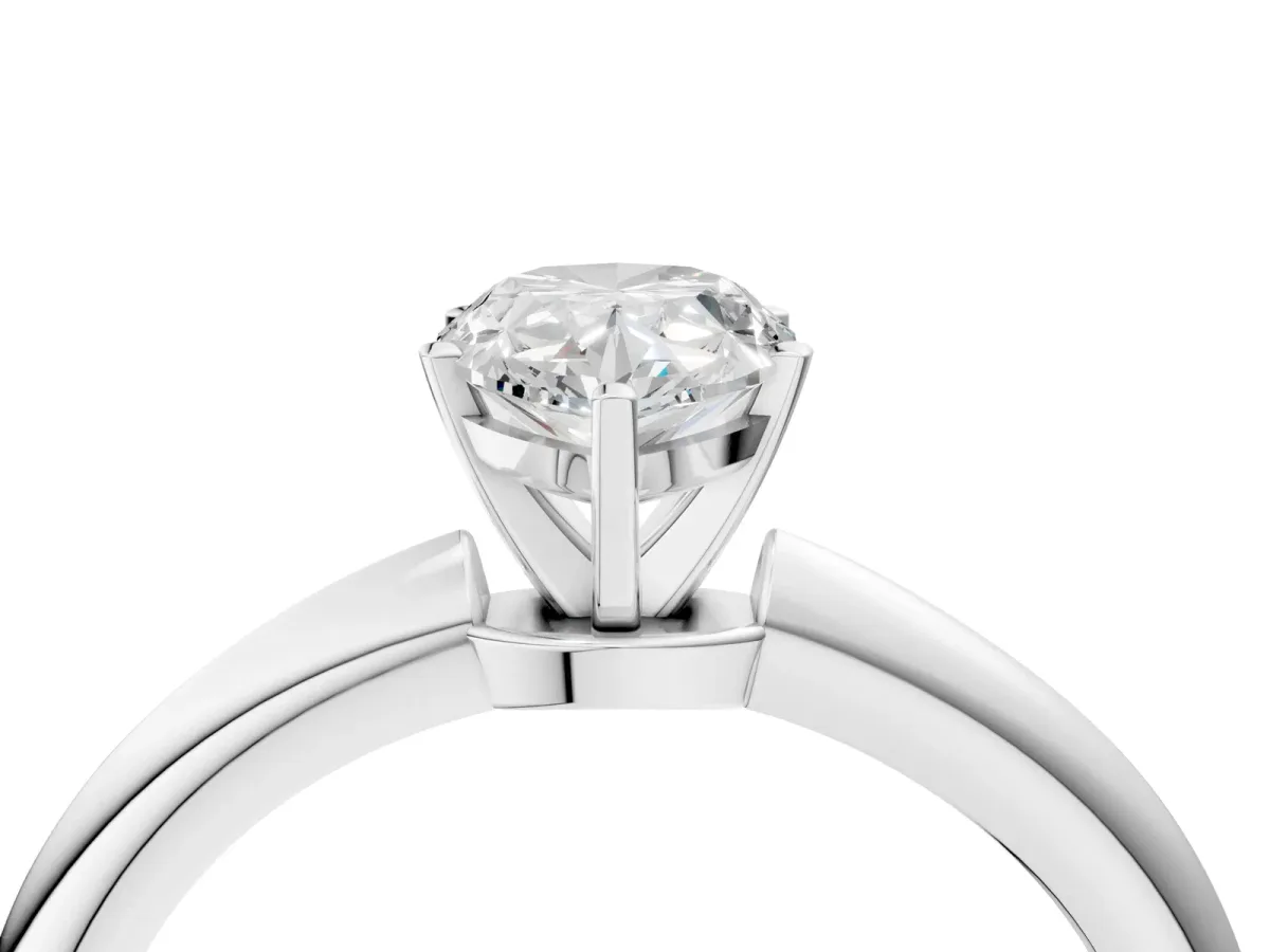 Pear Cut Diamond Solitaire Ring with Six-Prong Setting and Classic Band Silver