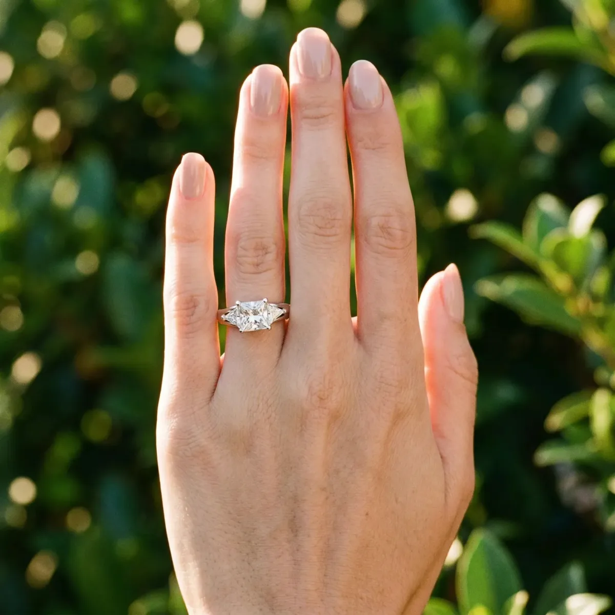 Three-Stone Princess Cut Cut Diamond Ring with Trillion Side Stones on a Split Shank Band Silver