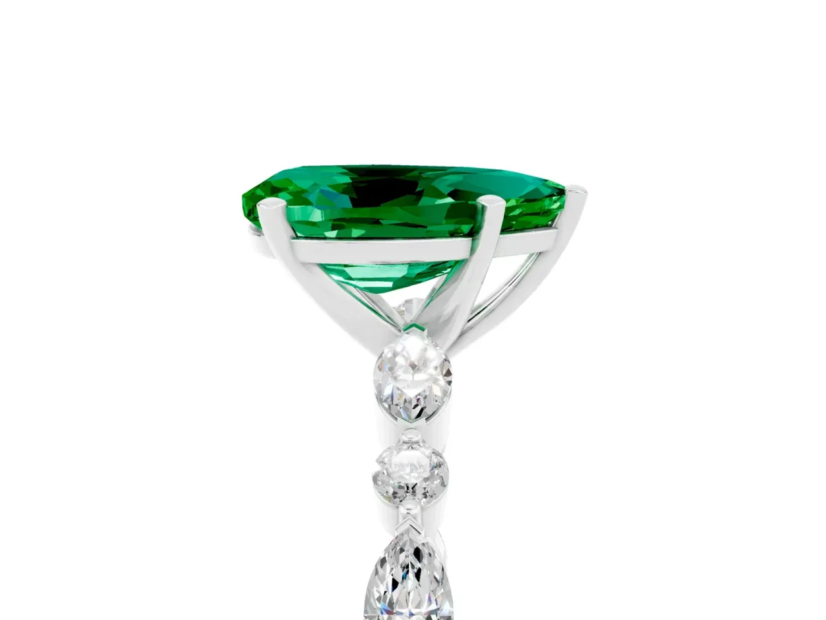 Pear Cut Emerald Ring with Marquise and Round Side Stones and Four-Prong Setting Silver