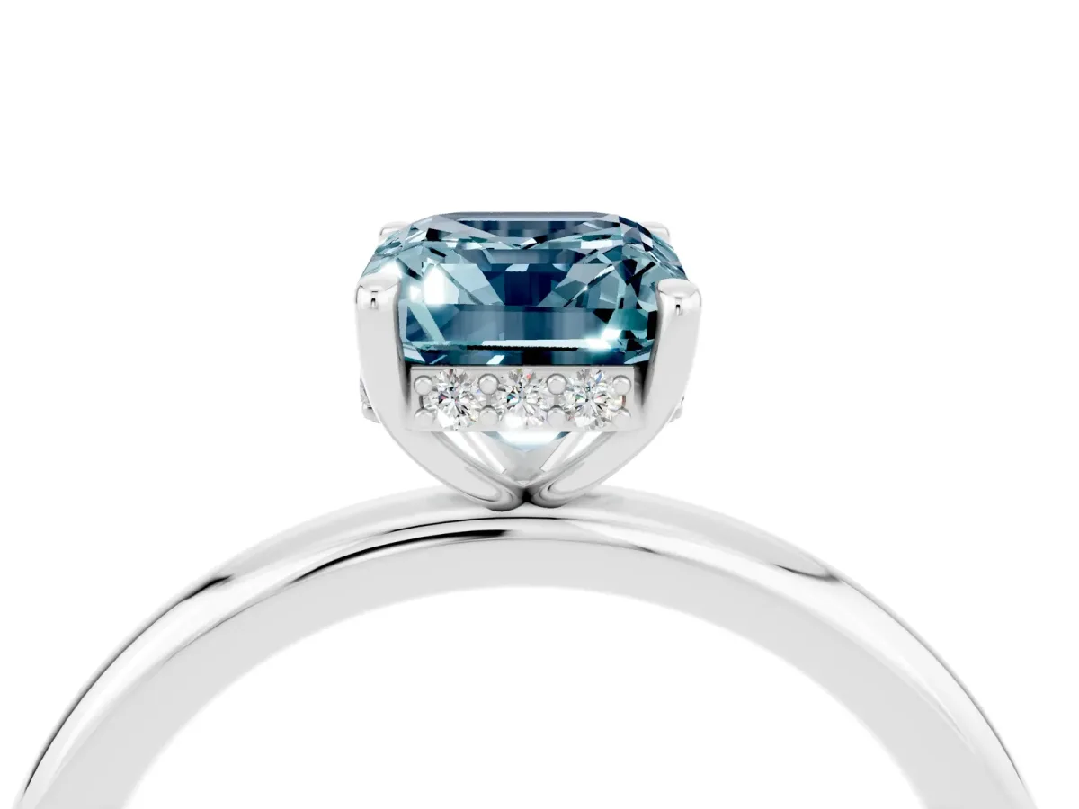 Emerald Cut Aquamarine Solitaire Ring with Thin Band and Four-Prong Setting White gold