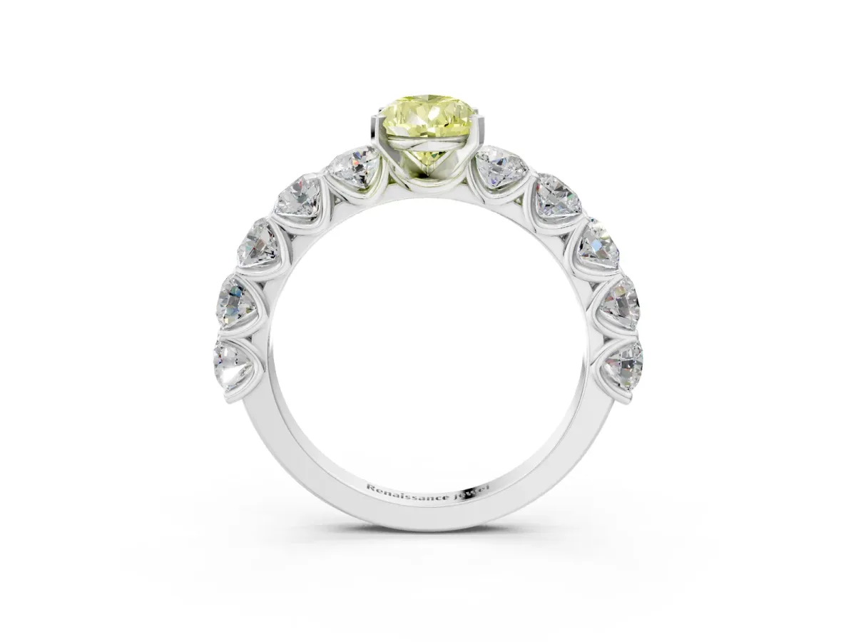 Fancy Yellow Pear Cut Diamond Prong Setting with Side Stones on a Pave Band Silver
