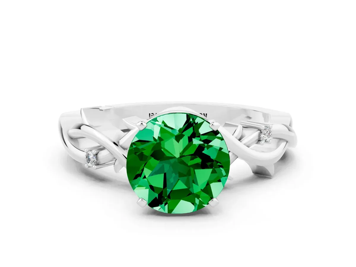 Round Cut Emerald Solitaire Ring with Twisted Band and Prong Setting White gold