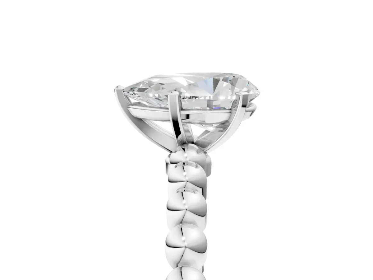 Pear Cut Diamond Solitaire Ring with Beaded Band and Prong Setting White gold