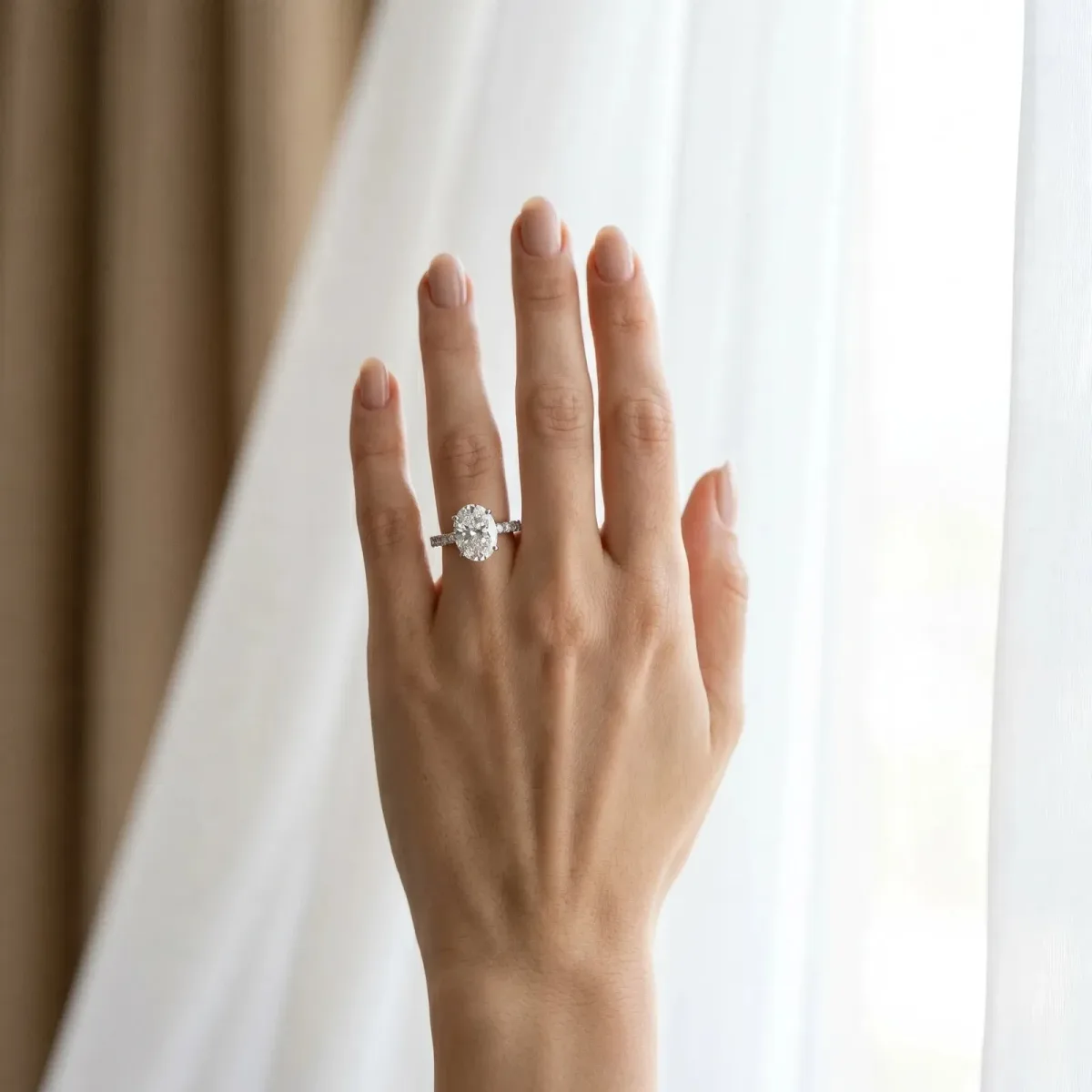 Oval Cut Diamond Solitaire Pavé Band with Four-Prong Setting White gold